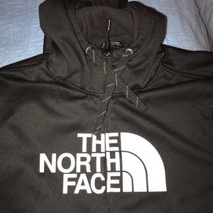 Men’s North Face black and white zip up jacket